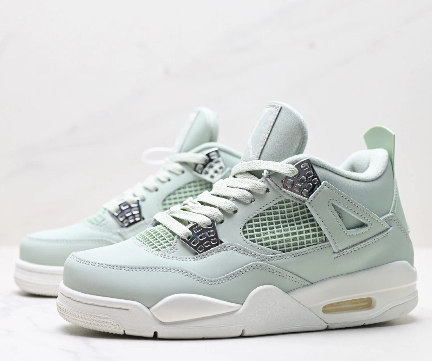 Jordan 4 RetroSeafoam Sail