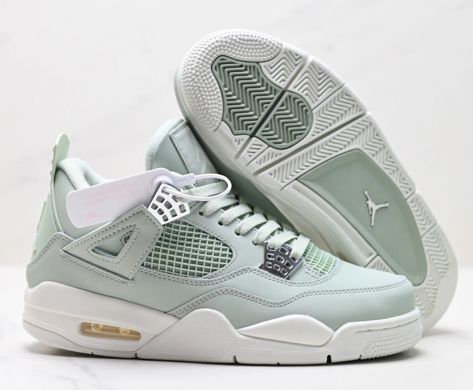 Jordan 4 RetroSeafoam Sail