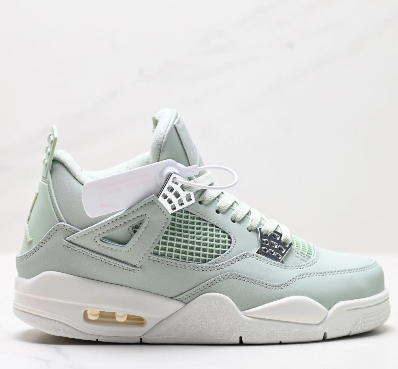Jordan 4 RetroSeafoam Sail